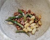 A picture of step 4 of Raw Mango Thecha.