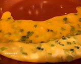 A picture of step 5 of Scallion Egg Roll Omelet.