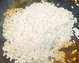 Foto del paso 5 de la receta: Merluza a la plancha con arroz de curry