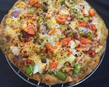 A picture of step 5 of Healthy Peri Peri cheese burst pizza.