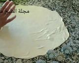 صورة لخطوة 4 من وصفة حلوة لقنيدلات بحشوة جوز الهند