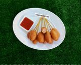 A picture of step 8 of Mini corndogs(spiced).