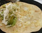 A picture of step 5 of Mexican avocado cheese taco.