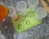 A picture of step 9 of Orange Popsicle.
