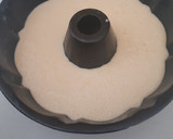 Foto del paso 4 de la receta: Bizcocho de naranja bañado en chocolate con almendras laminadas