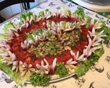 Une image de l'étape 11 de Salade de tomates,scarole,céleri et thon aux radis « fleurs ».