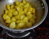 A picture of step 2 of Lasaniya Bateka subji.