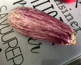 Une image de l'étape 1 de Aubergine et poivron aux tomates confites, coriandre et épices.
