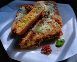 A picture of step 7 of Cheesy Peri Peri Toast Sandwich.