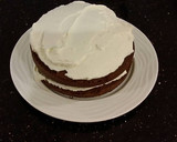 A picture of step 17 of Mocha Layer Cake with Whipped Mascarpone Cream and a Coffee Glaze Drizzle.