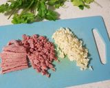 A picture of step 1 of Aglio Olio and Corned Beef bits.