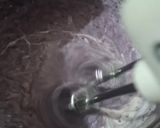 A picture of step 6 of Mulberry Ice cream with fresh cream.