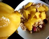 A picture of step 2 of My Bran flakes with Dried Fruit and fresh sliced Mango 😍.