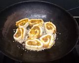 A picture of step 8 of Steamed stuff suji rolls.