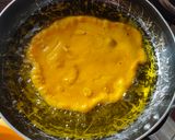 A picture of step 4 of Mango malpua with fresh cream.