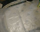 A picture of step 7 of Chocolate and biscuit salami.