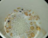A picture of step 2 of Oats in coffee mug easy 2 min breakfast.