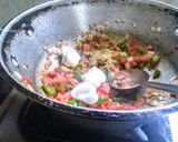 A picture of step 4 of Paneer stuffed kulcha sandwich.