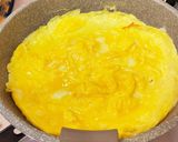 A picture of step 8 of Fluffy Omurice with Plenty of Cheese Sauce.
