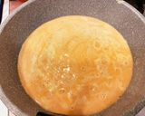 A picture of step 10 of Fluffy Omurice with Plenty of Cheese Sauce.