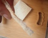 A picture of step 2 of Paneer chicken bread roll.