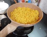A picture of step 1 of Maggi Corn Pizza.