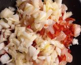 Foto del paso 2 de la receta: Arepas rellenas de pollo, tomate y queso