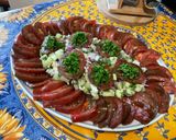 A picture of step 16 of Composed Salad with Black Tomatoes, Cucumber, Red Onion, Feta, and Parsley.