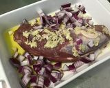 A picture of step 6 of Oven-Roasted Pork Tenderloin with Pink Garlic, Red Onion, and Rosemary.