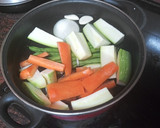 Foto del paso 2 de la receta: Cinta de lomo de cerdo a la plancha con verduras cocidas