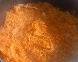 A picture of step 14 of Coconut party jollof rice.