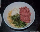 A picture of step 2 of Kufteh bozbash (stuffed meatball).