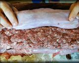 Foto del passaggio 3 della ricetta Coniglio ripieno di Funghi e Salsiccia al Forno