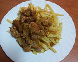 Foto del paso 4 de la receta: Cerdo a la cerveza con papas fritas