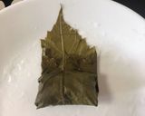 A picture of step 4 of Dolmas / Dolmades (Stuffed Grape Leaves).