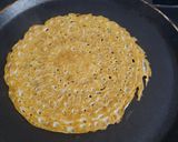 A picture of step 3 of Jowar rava dosa.