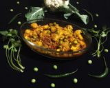 A picture of step 7 of Aloo Gobi Matar.
