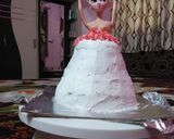 A picture of step 6 of Barbie doll cake.