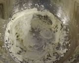 A picture of step 8 of White Chocolate Truffle Cupcakes with Whipped White Chocolate Mascarpone Frosting.