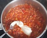 A picture of step 4 of Creamy Tomato Penne with Pork and Basil.