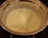 A picture of step 3 of Mint Chocolate Chip Brownie Ice Cream Bars.