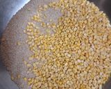 A picture of step 1 of Broken wheat khichdi.