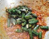 A picture of step 6 of Masaledar dahi (curd) bhindi.