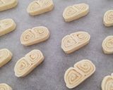 Une image de l'étape 3 de Biscuits palmiers.