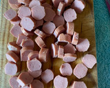 Foto del paso 4 de la receta: Arroz suelto con chorizo y salchichas