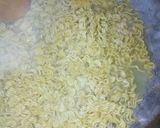 A picture of step 4 of Jollof Vegetable noodles with fried eggs.