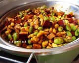 A picture of step 5 of Savory Braised Tofu with Edamame and Corn.