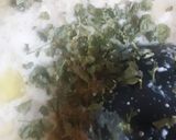 A picture of step 5 of Nawabi Paneer Restaurant style paneer in white gravy.