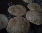 A picture of step 10 of Bedwa puri with aalu ki sabzi.