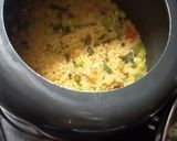 A picture of step 4 of Daliya Pulao.